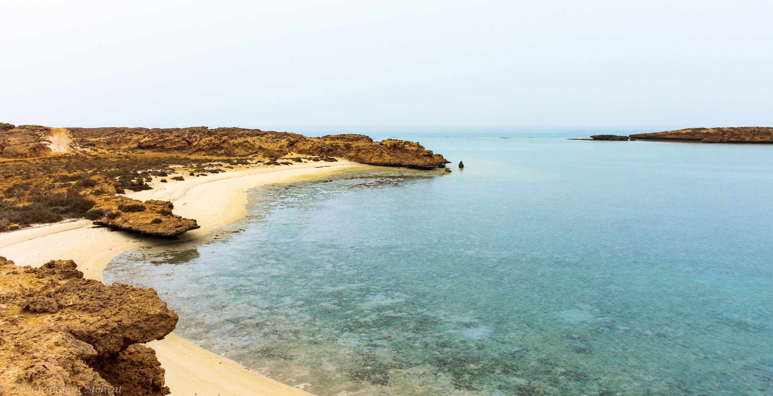 Empty pale shoreline and shallow water on Farasan Island